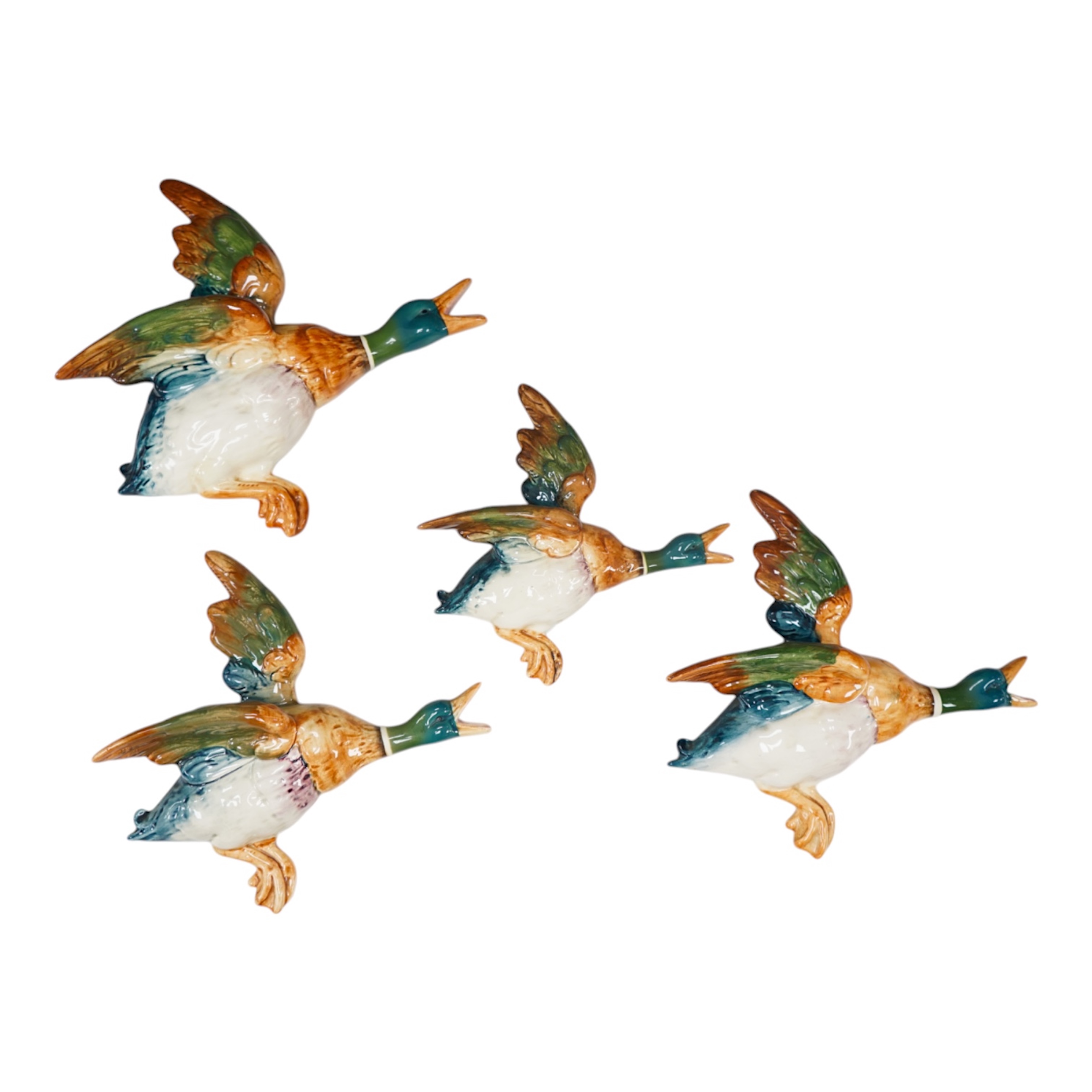 A graduated set of four Beswick Mallard ducks, largest 30cm long. Condition - good